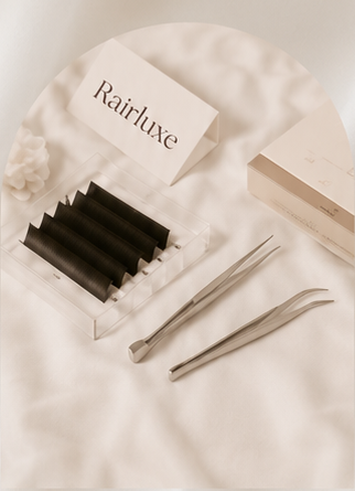 Rairluxe lash kit and tweezers on silk